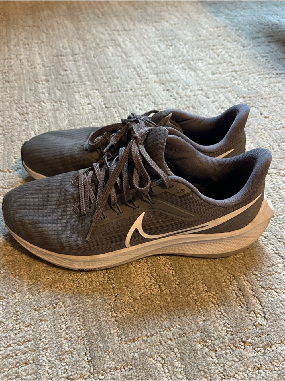 Nike Women’s Dark Gray Athletic Running Shoes with White Swoosh